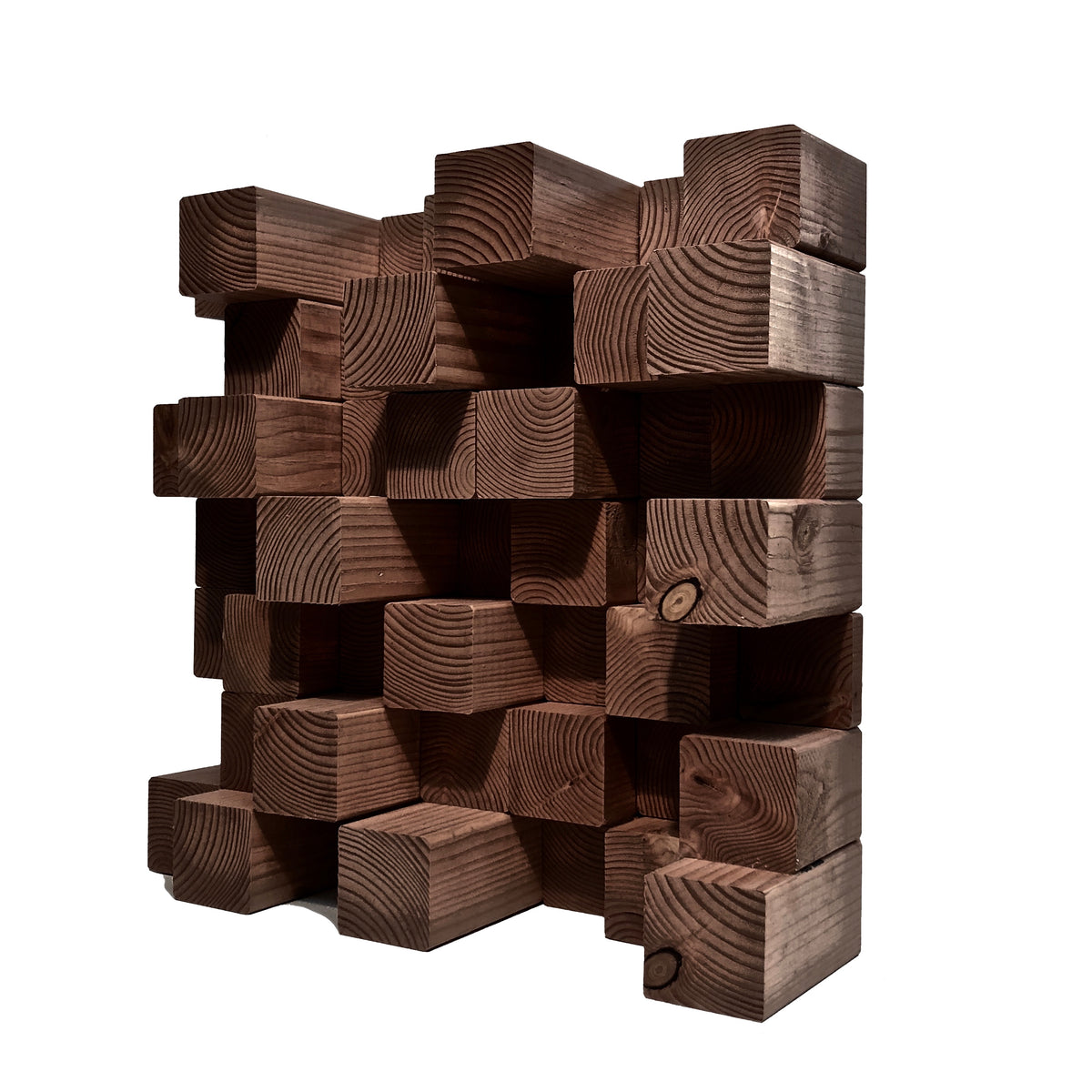 A modern geometric classic grey acoustic diffuser made of stacked rectangular wooden blocks with visible grain patterns, shown against a plain white background.